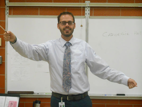 Band Director Mr. Andrew Brough strikes up the band.