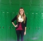 Junior Kristin Beighley wears a black cardigan with a maroon tank and ivory scarf to make the perfect fall look.