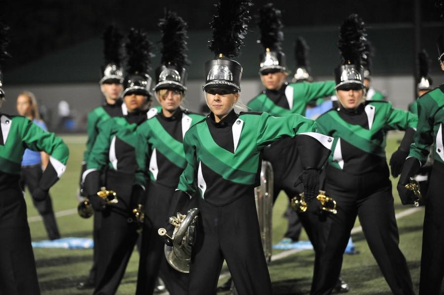 The marching band performs their 2014 competition show Human After All.