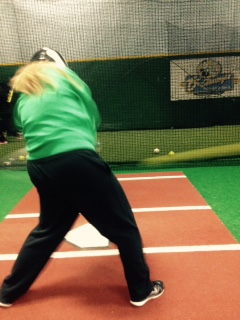 Freshman Anna Fox practices her swing for the upcoming softball season.