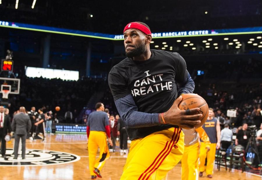 NBA star Lebron James shows his disapproval of unpunished police brutality in an I cant breathe t-shirt. Photo courtesy of New York Daily News