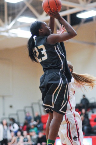 Junior Denissa Sly takes a jump shot (Photo courtesy of Northmont Yearbook)