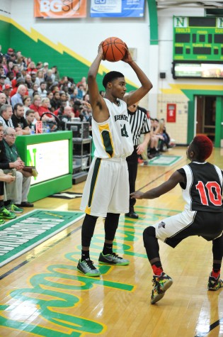 Junior Jason Biggs looks to pass during the home game versus West Carrollton (photo courtesy of Northmont Yearbook).