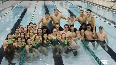 Members of both the boys and girls swimming teams take time for a quick picture