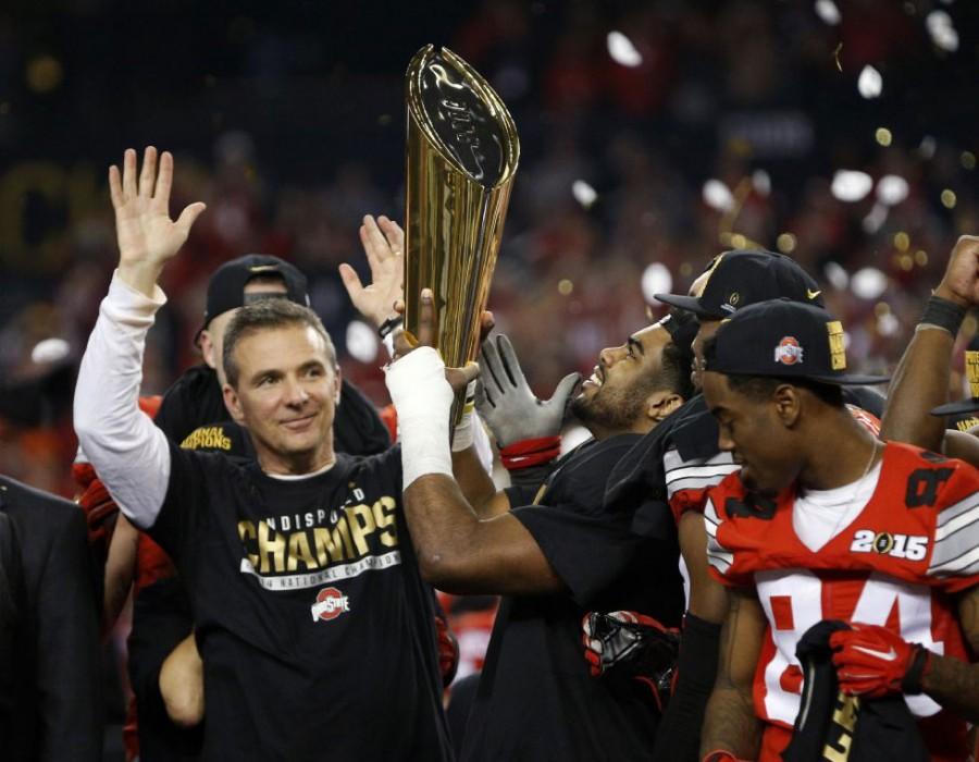 Head+Coach+Urban+Meyer+and+the+Ohio+State+Buckeyes+celebrate+after+beating+Oregon+and+being+crowned+National+Champions+%28Photo+courtesy+of+the+Columbus+Dispatch%29