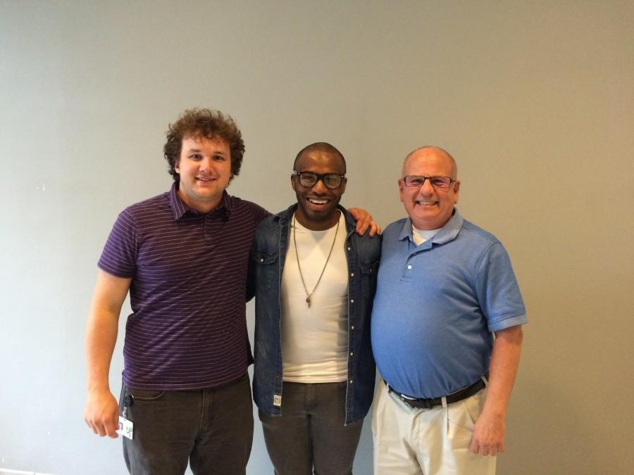 Broadway actor Jamard Richardson poses with his former classmate (and now a Language Arts teacher) Mr. Ranger Puterbaugh and choir director Mr. Mark Barnhill.
