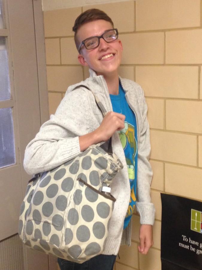 Sophomore Kyle Davis carries a bag that could be subject to search at local movie theaters.