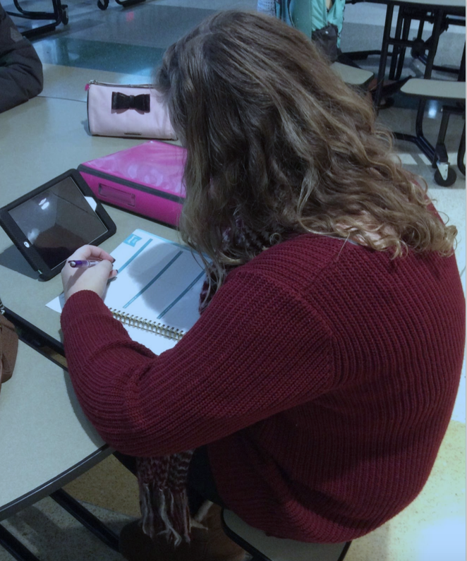 In preparation for scheduling February 16, freshman Delaney Schmidt creates a list of classes shed like to take next year.