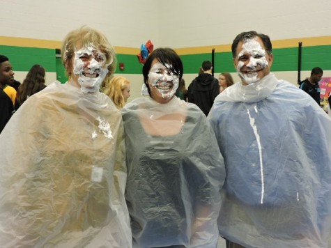 Superintendent Dr. Sarah Zatik, art teacher Ms. Christine Hall, and assistant superintendent Mr. Tony Thomas received a pie in the face during the Activity Fair.