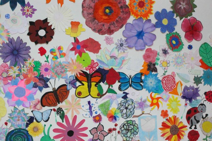 A portion of the Flower Wall, featuring the varied submissions of the students in various art classes