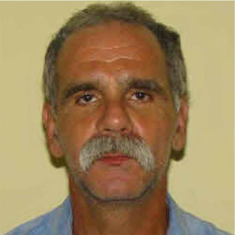 Runaway John Modie, 58, was captured at a Shell gas station