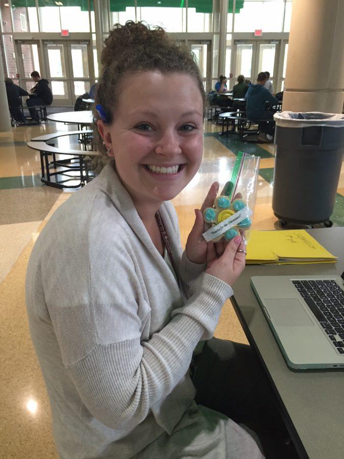 Ms. Theresa Rotuno holds her cookie from Student Government for teacher appreciation week. 