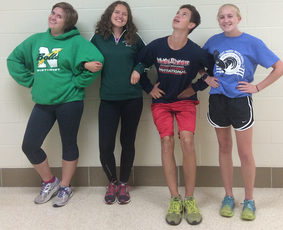 Sophomore Morgen Tracey,  junior Sofia Sjoeberg, freshman Drew Haker, and freshman Jenna Stowers at cross country practice.