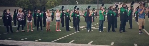 Catalyst performs the Star Spangled Banner at the football game on September 10, 2016.