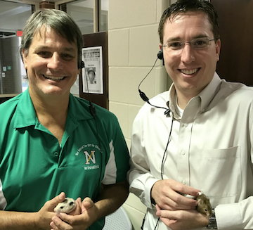 Head Principal George Caras and Assistant Principal Jason Inkrott hold the IMC hamsters