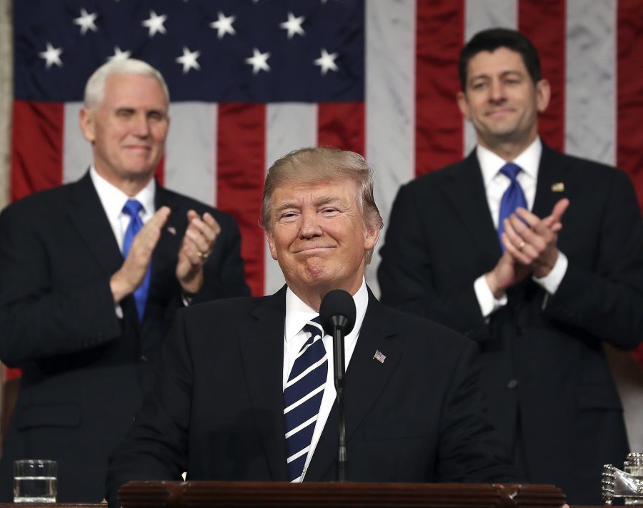 President Donald Trump, Vice President Mike Pence, and House Speaker Paul Ryan on March 2. (courtesy of  Jim Lo Scalzo via chicagoreader.com)