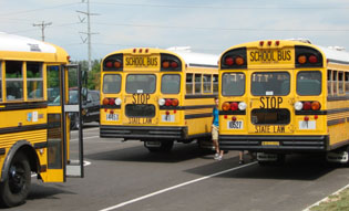 With less than one month left of school, students leave on buses.