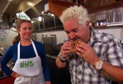 Guy Fieri, celebrity chef, eats a Northmont chicken sandwich. (Picture courtesy of The Daily Meal, edited by Alysson Pahl)