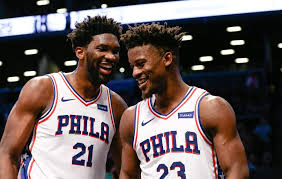 Jimmy Butler shares a laugh with his new teammate Joel Embiid after a big win against the New Orleans Pelicans (Sports Center).