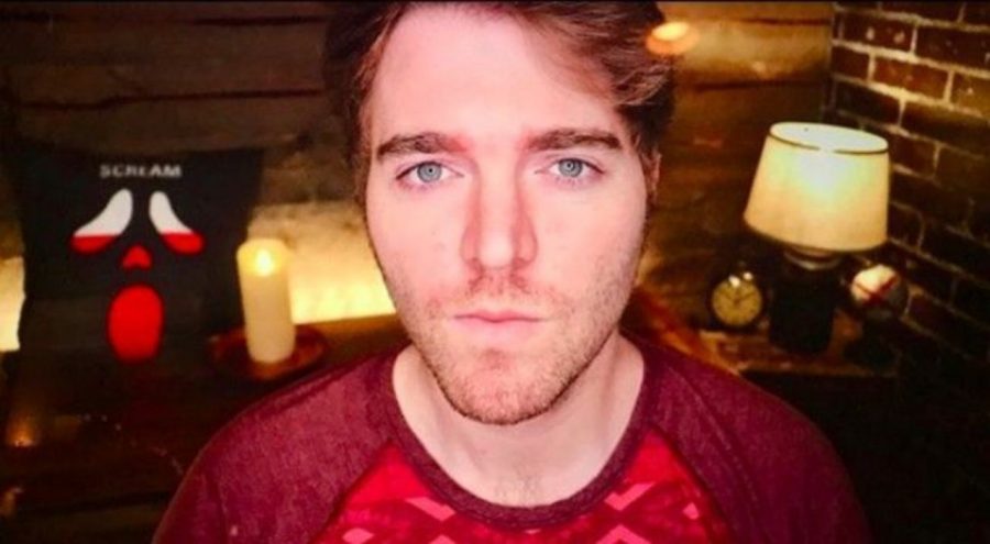 YouTuber+Shane+Dawson+in+his+conspiracy+theory+filming+room%2C+wearing+his+conspiracy+theory+shirt%0A%28courtesy+of+popculture.com%29.