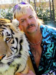 Joe Exotic with one of his big cats at his zoo, GW Zoo
Credit: Boston Globe