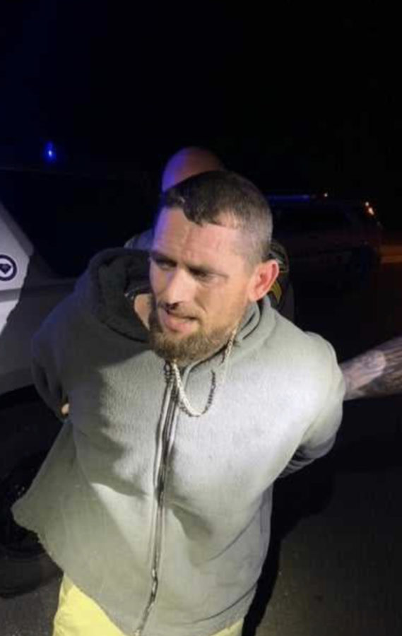 The Moment police arrested William Spivey after he was found hiding early Thursday.