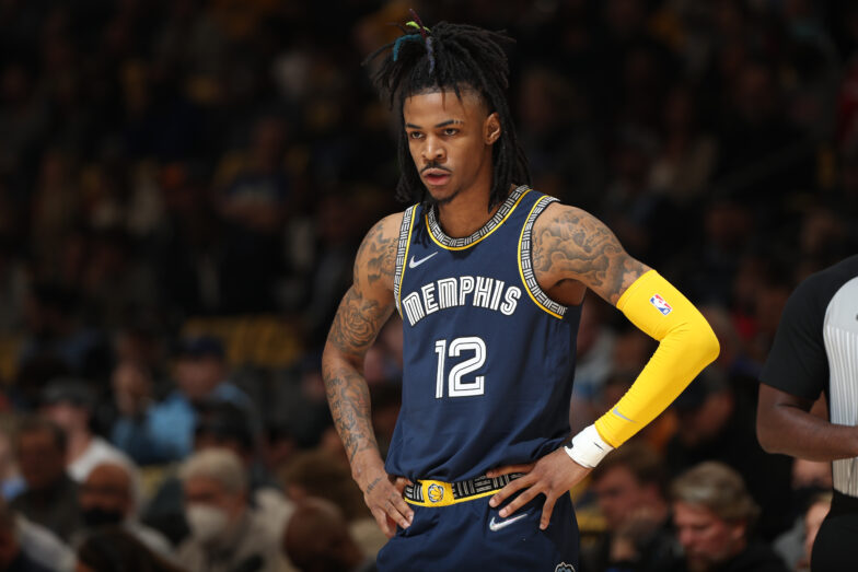 MEMPHIS, TN - APRIL 19: Ja Morant #12 of the Memphis Grizzlies looks on during Round 1 Game 2 of the 2022 NBA Playoffs on April 19, 2022 at FedExForum in Memphis, Tennessee. NOTE TO USER: User expressly acknowledges and agrees that, by downloading and or using this photograph, User is consenting to the terms and conditions of the Getty Images License Agreement. Mandatory Copyright Notice: Copyright 2022 NBAE (Photo by Joe Murphy/NBAE via Getty Images)