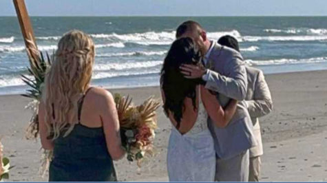 Samantha Miller And Aric Hutchinson Kissing At The Alter.