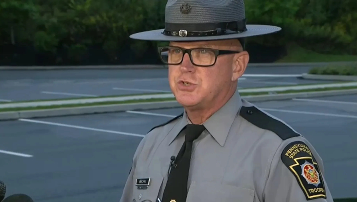 Pennsylvania State Trooper David Beohm talking to reporters after the nine juveniles were captured early Monday morning.  
