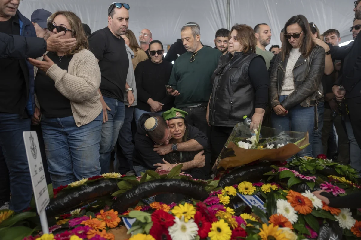 Israeli Mother at her sons funeral after he died fighting for the Gaza Strip 