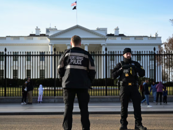 Secret Service officers on patrol near the White House.