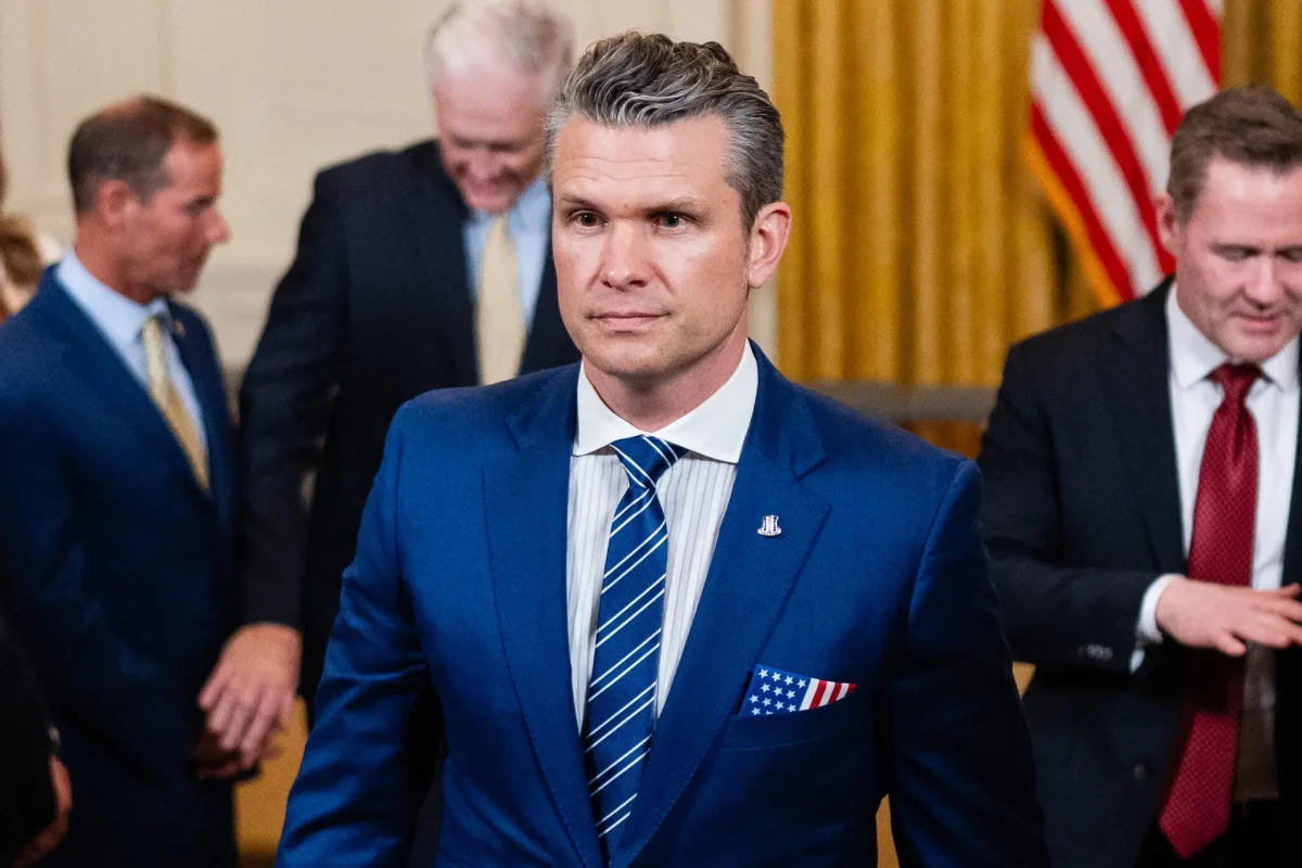 Secretary of Defense Pete Hegseth at a government meeting of some sort