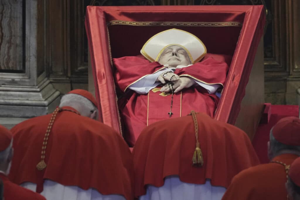 Several Cardinals pay their respects to Pope Francis on April 23, 2025. (Photo by ANDREW MEDICHINI/POOL/AFP via Getty Images)
