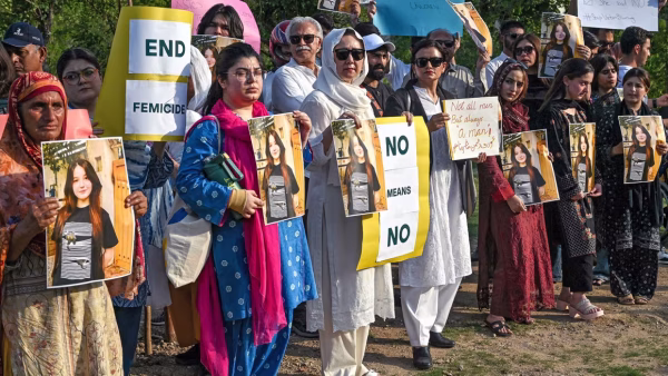 Protesters holding posters of Sana Yousaf. Farooq Naeem /AFP/Getty Images