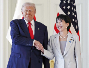 President Donald Trump and Japanese Prime Minister Sanae Takaichi review an honor guard at the Akasaka State Guest House. 
