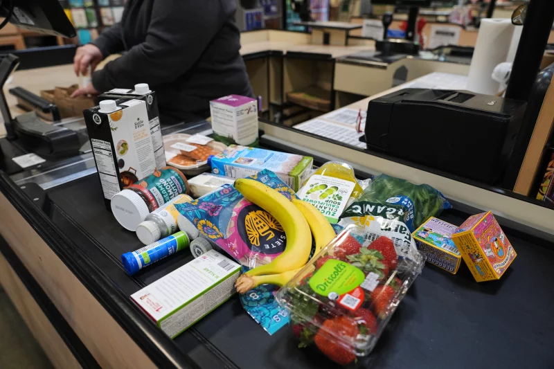 A cashier scans groceries, including produce, which is covered by the USDA Supplemental Nutrition Assistance Program (SNAP), at a grocery store in Baltimore on Monday. ( AP Photo/
Stephanie Scarbrough / Nov. 11, 24 ).