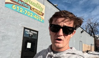 Podcaster Nick Shirley in front of the Daycare he accuses of fraud