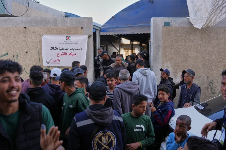 Palestinians outside a polling station