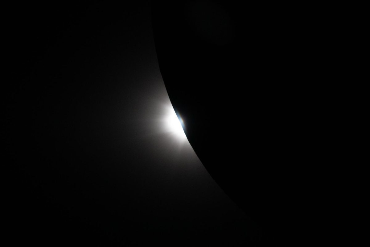 A photo of the moon being eclipsed by the sun
